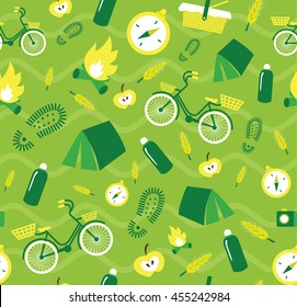 Vector creative seamless pattern with hiking elements camp fire, compass, tent, bicycle