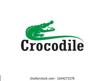 Vector of crocodile design and the letters on white background. Wild Animals. Reptile. Easy editable layered vector illustration.