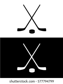 Vector Crossed Hockey Sticks and Puck