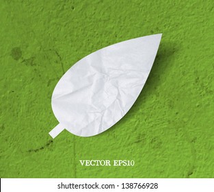 Vector crumpled paper leaf icon over grungy background