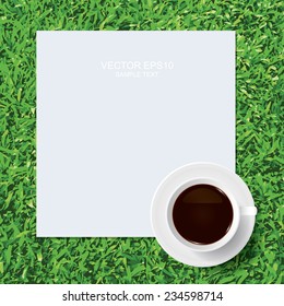 Vector cup of coffee and white paper texture on green grass background.