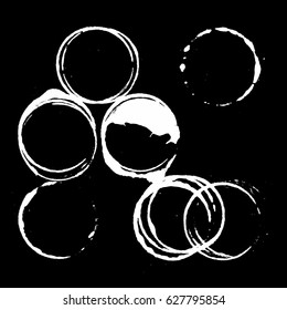 Vector cup traces and spots collection. White drink stains illustration on black background isolated. Splash and blots concept for grunge design