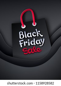 Vector cut paper art style illustration of Black Friday sale shopping bag.
