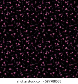 Vector Cute floral seamless pattern in the small flower. Purple and pink flowers on a black background.