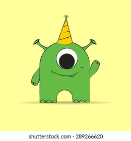Vector cute green monster in a celebratory cap