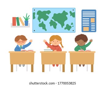 Vector cute happy schoolchildren sitting at the desks with hands up. Elementary school classroom illustration. Clever kids at the lesson. Boys and girl ready to answer teacher’s question.
