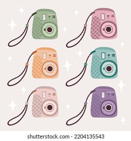 Vector cute illustration set with instant camera with different colors and flash elements