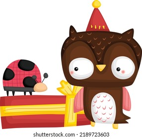 un vector de un búho lindo con un regalo de cumpleaños