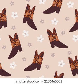 Vector cute seamless pattern with bohemian cowboy boots and flowers