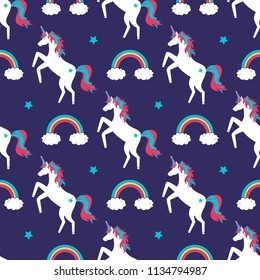 Vector cute seamless pattern with unicorns, rainbows and stars