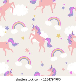 Vector cute seamless pattern with unicorns, rainbows and clouds