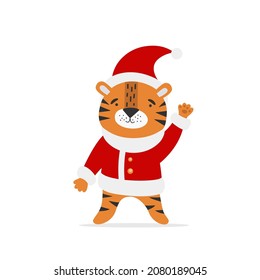 Vector cute tiger on a white background. New Year 2022 symbol. Funny tiger cub wearing santa claus hat. Christmas card.