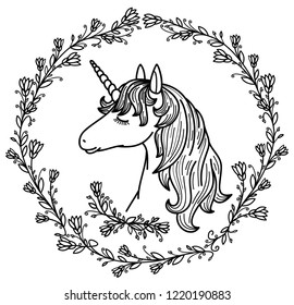 Vector cute unicorn  in   floral frame,  black silhouette.