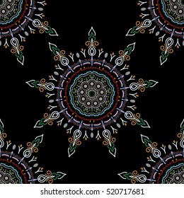 Vector cutout paper lace texture, green, blue and pink tulle on a black background, swirly seamless pattern, eps10.