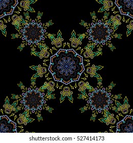 Vector cutout paper lace texture, blue, neutral and yellow tulle on a black background, swirly seamless pattern, eps10.