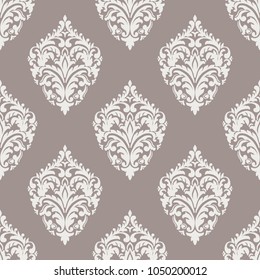 Vector damask seamless pattern background. Classical luxury old fashioned damask ornament, royal victorian seamless texture for wallpapers, textile, wrapping. Exquisite floral baroque template.