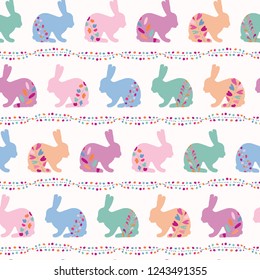Vector Decorated Easter Bunnies Seamless Pattern. Rabbit Illustration with Folk Flowers. Hand Drawn Ethnic Animal  for Spring Stationery, Baby Textile, Boho Fabric, Christian Celebration Packaging. 