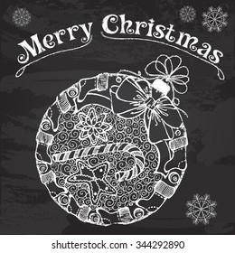 Vector decorative Christmas ball with sweets and socks on the chalkboard. Vector illustration for Christmas and New Year