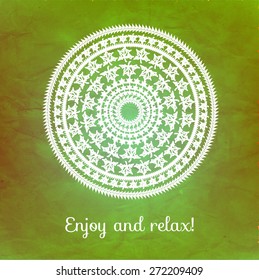 Vector decorative design element. Abstract background with lettering "Enjoy and relax". Ornamental mandala with herbal elements. Abstract emblem.
