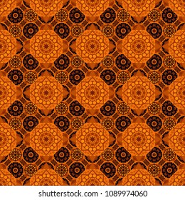 Vector decorative floral embroidery seamless pattern, ornament for textile, kerchief, pillow or handbag decor. Bohemian style background in black, orange and brown colors.