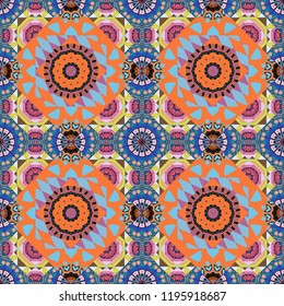 Vector decorative floral embroidery seamless pattern, ornament for textile, kerchief, pillow or handbag decor. Bohemian style background in blue, yellow and brown colors.