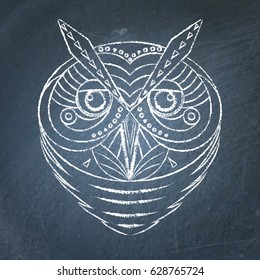 Vector decorative owl portrait on chalkboard background. Owl head in geometric style.