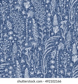 Vector Denim floral seamless pattern. Wildflowers and Grass background. Blue Jeans cloth background with Wild Flowers