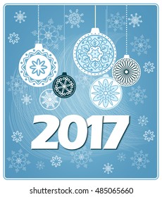 Vector design of 2017 new year`s card with decorated balls on the blue background with snowflakes.  EPS 10.