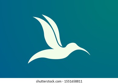 Vector design of a bird in flight with a minimalist and modern shape in gold.