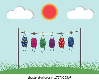 Vector design. The colorful cloth face mask is hanging for sunlight get dried after used and washed. Reuse after cleanness for protect virus. 