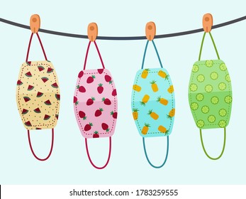 Vector design. The colorful fruits pattern cloth face mask is hanging for sunlight get dried after used and washed. Reuse after cleanness for protect virus. 