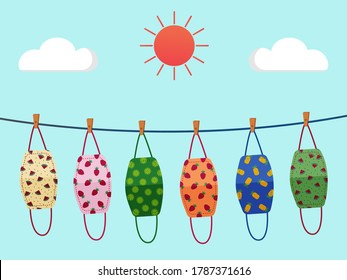 Vector design. The colorful fruits pattern cloth face mask is hanging for sunlight get dried after used and washed. Reuse after cleanness for protect virus. 