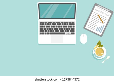 vector design concept of Top view working desk. The device consists of Laptop computer, lemon tea, writing pad.