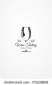 Vector design element. Illustration of wine glass silhouette with decorative ornametom. The template for the logo, invitations or poster
