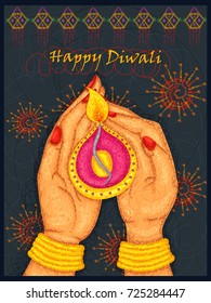 Vector design of hand of Indian lady holding diya for Diwali on colorful art style background of India
