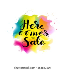 Vector design with lettering "Here comes the Sale".