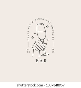 Vector design linear template logo or emblem - hand with glass of drink. Abstract symbol for cafe or bar