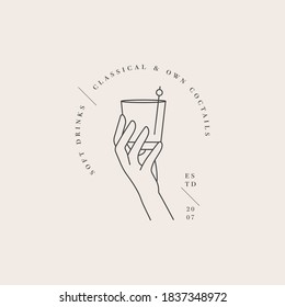 Vector design linear template logo or emblem - hand with glass of drink. Abstract symbol for cafe or bar