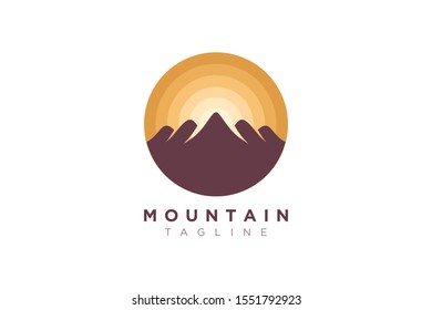 Vector design of the mountain and the sun in a minimalist and simple shape in a circle