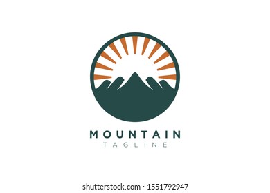 Vector design of the mountain and the sun in a minimalist and simple shape in a circle