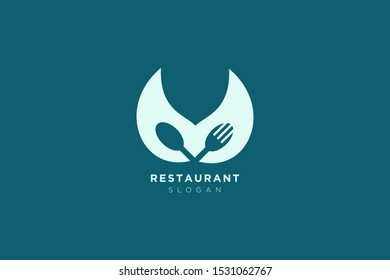 Vector design of a restaurant logo with spoons, leaves and forks. For food, beverage, restaurant product labels.