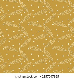 A vector design of seamless pattern with white feathers and white dots on dark yellow background