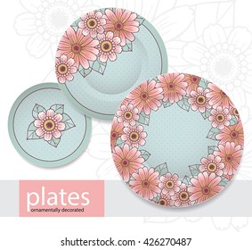 vector design for a set of plates of different sizes with floral decor in pastel colors
