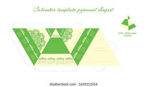 Vector desktop pyramid calendar template for 2022. Decoration for your home, business. Corporate and business calendar. Calendar with mandala 2022 in a minimalist style. The week starts on Sunday