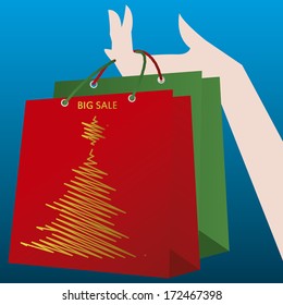 Vector different christmas shopping bags and hand