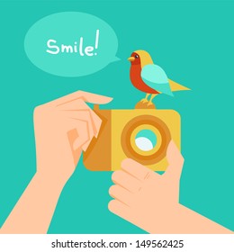 Vector digital camera and cartoon bird - illustration in flat style