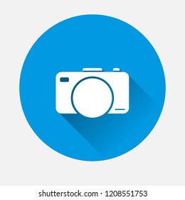 Vector digital camera icon on blue background. Flat image Retro camera with long shadow. Layers grouped for easy editing illustration. For your design.