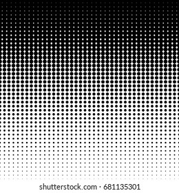 Vector diminishing halftone dots. White dots on black background.
