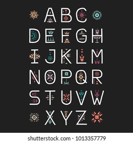 Vector display alphabet. Capital letters decorated with color floral patterns on a black background.