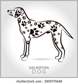 Vector dog Dalmatians with spots on a gray background with an inscription